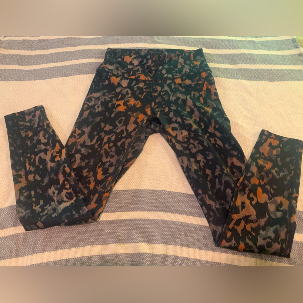 Fabletics Black and Orange Leopard print Leggings with Performance Stretch